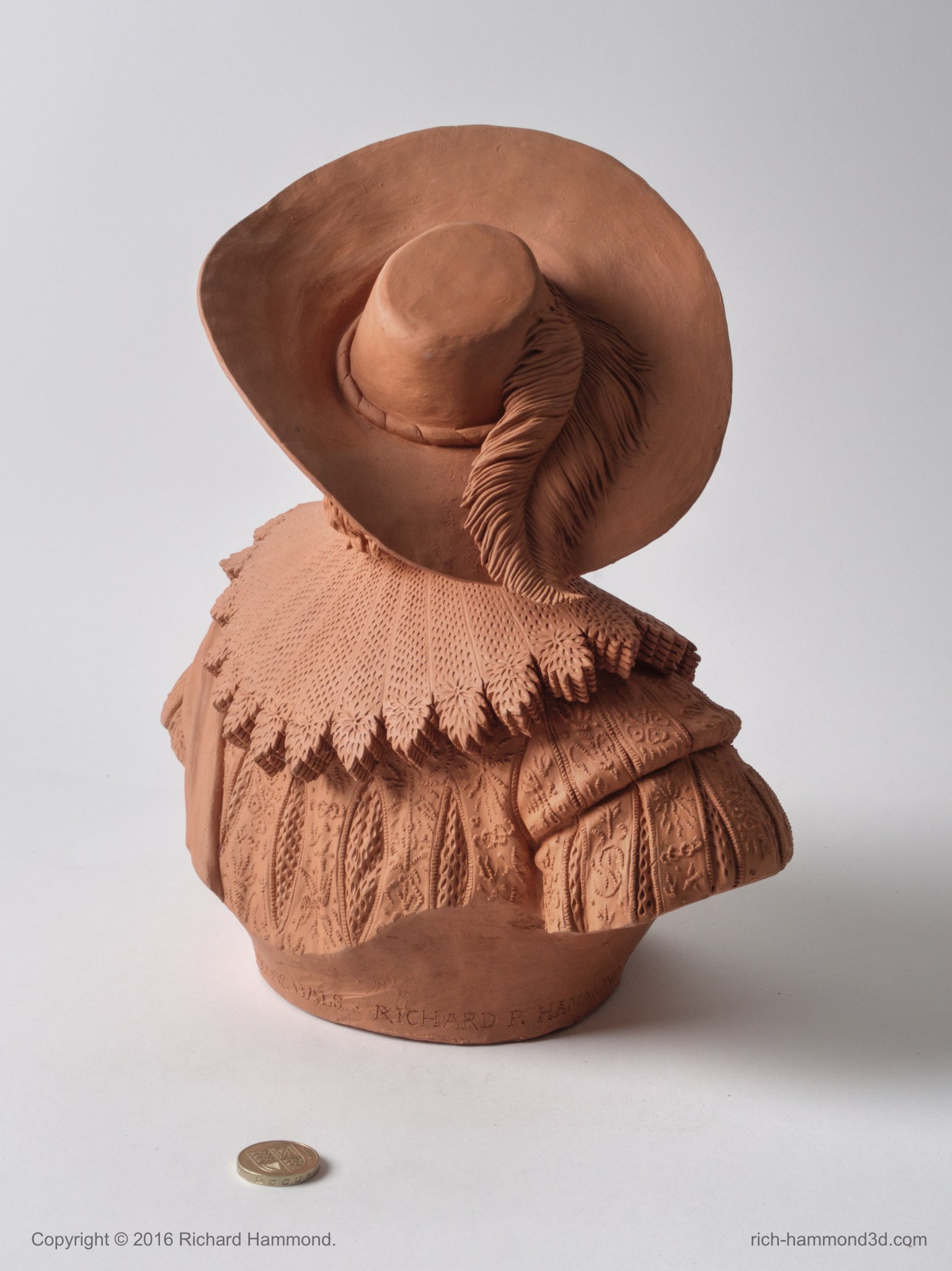 I had to develop a technique to render the fine detail of the embroidery in terracotta. It was rewarding to expand my control of the material.