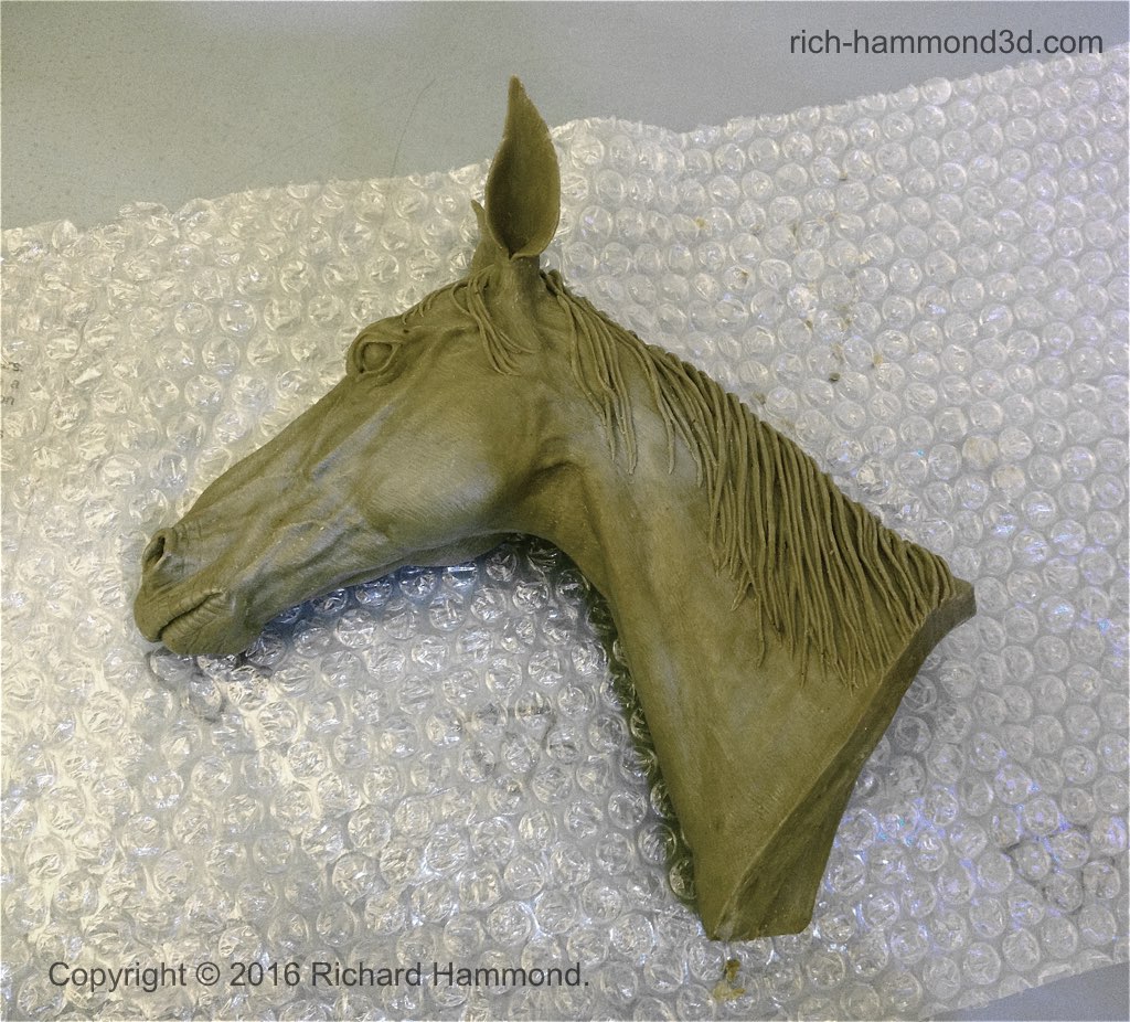 A hand-finished wax ready for delivery to the foundry for bronze casting via the lost wax process.